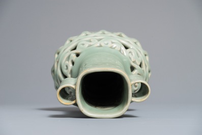 A Chinese celadon-glazed reticulated double-walled vase, 19/20th C.