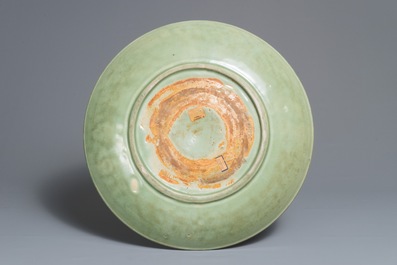 A massive Chinese Longquan celadon dish with underglaze design, Ming