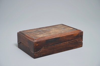 A Chinese calligraphy or artist's set in wooden box containing various seals, an ink stone and more, 19/20th C.