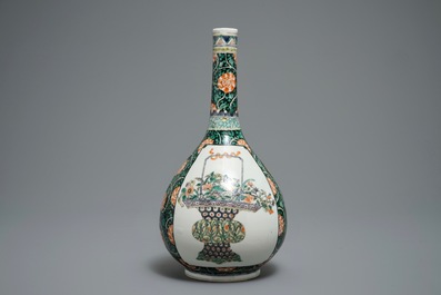 A Chinese famille verte bottle vase with fine flower baskets, 19th C.