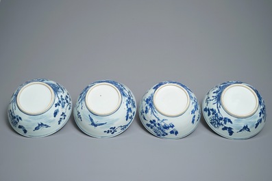 Four Chinese blue and white bowls with birds, butterflies and flowers, 19th C.