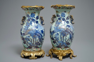 A pair of Chinese gilt-bronze mounted famille rose celadon vases, 19th C.