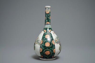A Chinese famille verte bottle vase with fine flower baskets, 19th C.