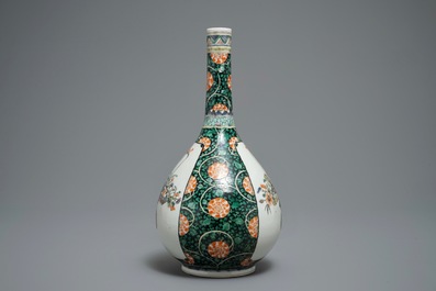 A Chinese famille verte bottle vase with fine flower baskets, 19th C.