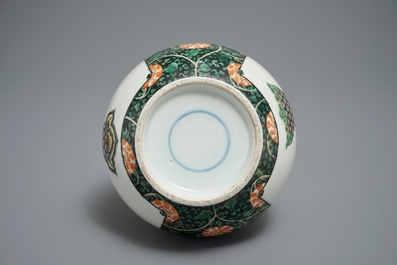 A Chinese famille verte bottle vase with fine flower baskets, 19th C.