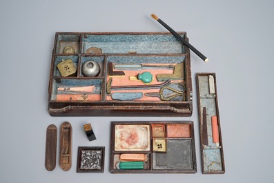 A Chinese calligraphy or artist's set in wooden box containing various seals, an ink stone and more, 19/20th C.