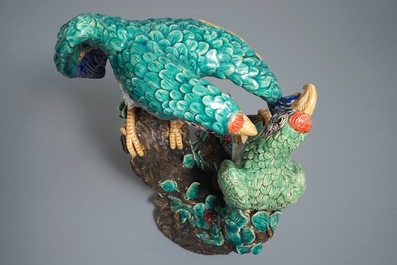 A large Chinese Shiwan pottery group of parrots, impressed mark, 20th C.