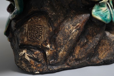A large Chinese Shiwan pottery group of parrots, impressed mark, 20th C.