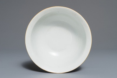A Chinese famille rose blue ground sgraffiato bowl, Qianlong mark, 19th C.