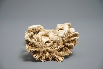 A Chinese carved ivory group of a lady with an elephant, 1st half 20th C.