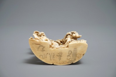 A Chinese carved ivory group of a lady with an elephant, 1st half 20th C.