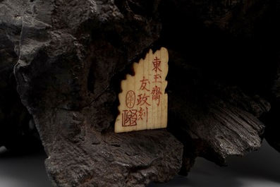 A Japanese carved ivory group on rootwood base, prob. Tokyo school, Meiji, 19th C.