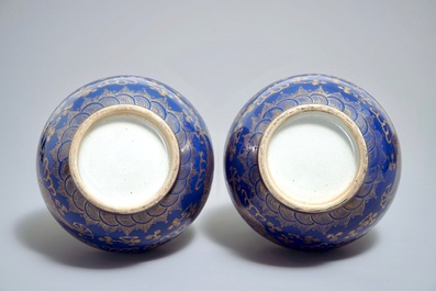 A pair of Chinese monochrome blue vases with gilt dragon design, 19th C.