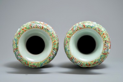 A pair of Chinese Canton famille rose celadon-ground vases, 19th C.