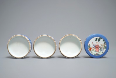 A Chinese blue-ground famille rose four-tier box, Tongzhi mark, 19th C.