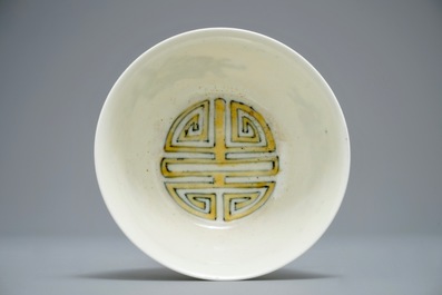 Three Chinese plates with dragons and phoenixes and an underglaze decorated bowl, Kangxi and Guangxu marks, 19/20th C.