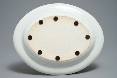 A Chinese export porcelain 'Mysterious urn' tureen and cover on stand, Qianlong/Jiaqing