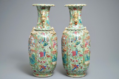 A pair of Chinese Canton famille rose celadon-ground vases, 19th C.