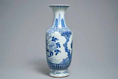 A large Chinese blue and white vase with a lady and calligraphy, 19th C.