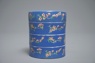 A Chinese blue-ground famille rose four-tier box, Tongzhi mark, 19th C.