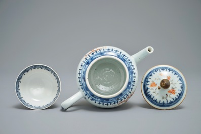 A Chinese famille rose mandarin teapot with cup and saucer, Qianlong