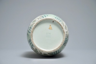 A Chinese famille rose rouleau vase with applied design of mythical beasts, Qianlong mark, 19th C.