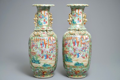 A pair of Chinese Canton famille rose celadon-ground vases, 19th C.