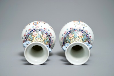 A pair of Chinese famille rose vases with playing boys, Qianlong mark, Republic, 20th C.