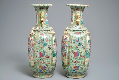 A pair of Chinese Canton famille rose celadon-ground vases, 19th C.