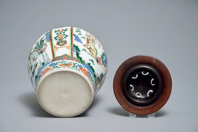 A Chinese wucai vase with mythical beasts, 19th C.