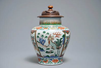 A Chinese wucai vase with mythical beasts, 19th C.