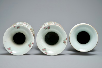 A pair of large Chinese Canton rose medallion vases and a fencai vase with ladies, 19/20th C.