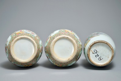 A pair of large Chinese Canton rose medallion vases and a fencai vase with ladies, 19/20th C.