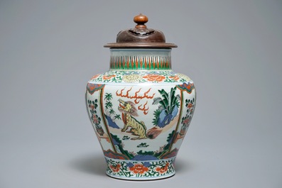 A Chinese wucai vase with mythical beasts, 19th C.