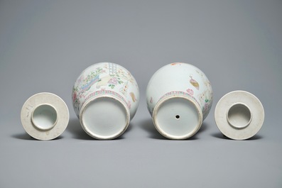 A pair of Chinese famille rose vases and covers with antiquities, 19th C.