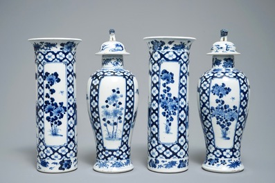 A Chinese blue and white four-piece garniture, Kangxi, 19th C.