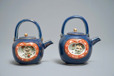 Two Japanese blue-ground Imari teapots with moulded designs of roosters and flowers, Edo, 17/18th C.