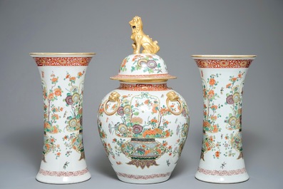 A famille verte-style three-piece garniture with fine flower baskets, Samson, Paris, 19th C.