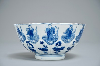 A Chinese blue and white moulded bowl with immortals, Chenghua mark, Kangxi