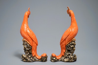 A pair of Chinese coral-ground models of phoenixes, 19/20th C.