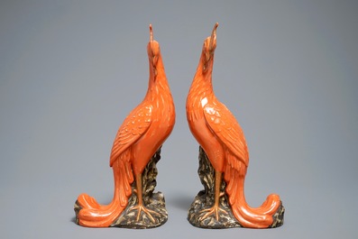 A pair of Chinese coral-ground models of phoenixes, 19/20th C.