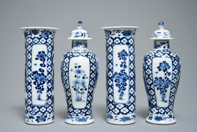 A Chinese blue and white four-piece garniture, Kangxi, 19th C.