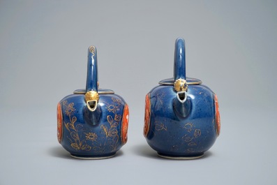 Two Japanese blue-ground Imari teapots with moulded designs of roosters and flowers, Edo, 17/18th C.