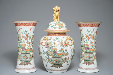 A famille verte-style three-piece garniture with fine flower baskets, Samson, Paris, 19th C.