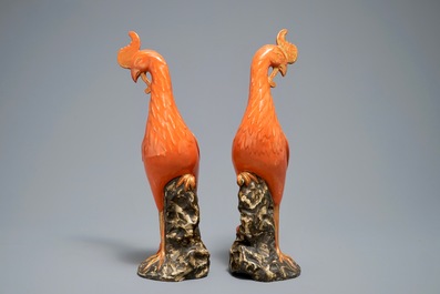 A pair of Chinese coral-ground models of phoenixes, 19/20th C.