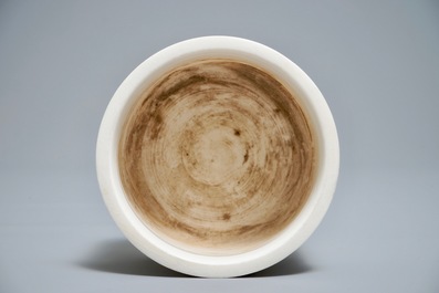 A Chinese cylindrical blanc de Chine Dehua censer on ruyi feet, 19/20th C.