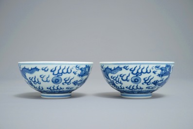 A pair of Chinese blue and white 'dragon' bowls, Guangxu mark, 19/20th C.