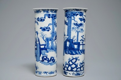Two Chinese blue and white sleeve vases with ladies in a garden, 19th C.