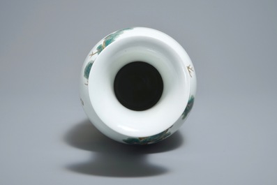 A Chinese famille rose vase with figures in a garden, Hongxian mark, 20th C.