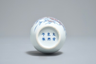 A Chinese blue and underglaze red 'sanduo' vase, Kangxi mark, 19/20th C.
